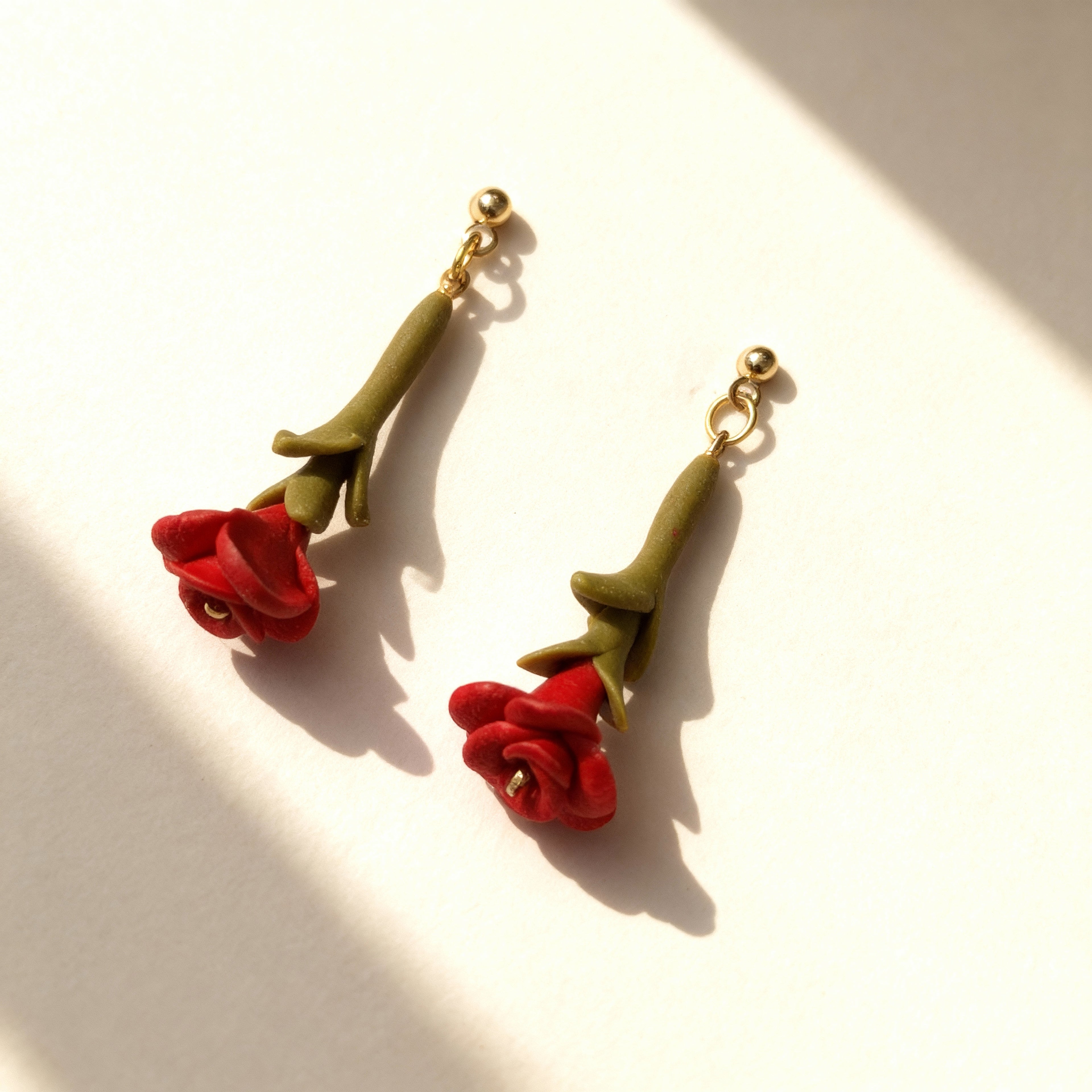 Handmade red rose clay drop earrings with gold stud and green stem