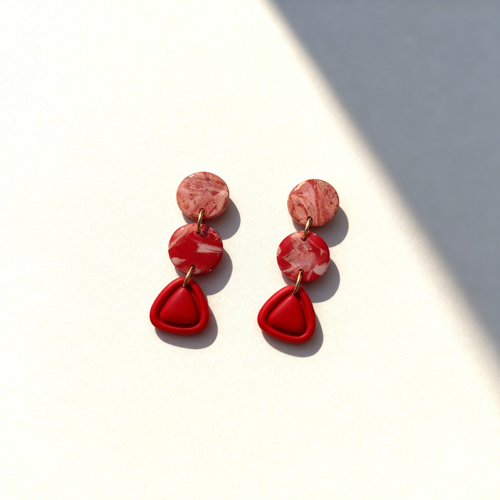 Handmade red marble clay triple drop earrings with geometric design