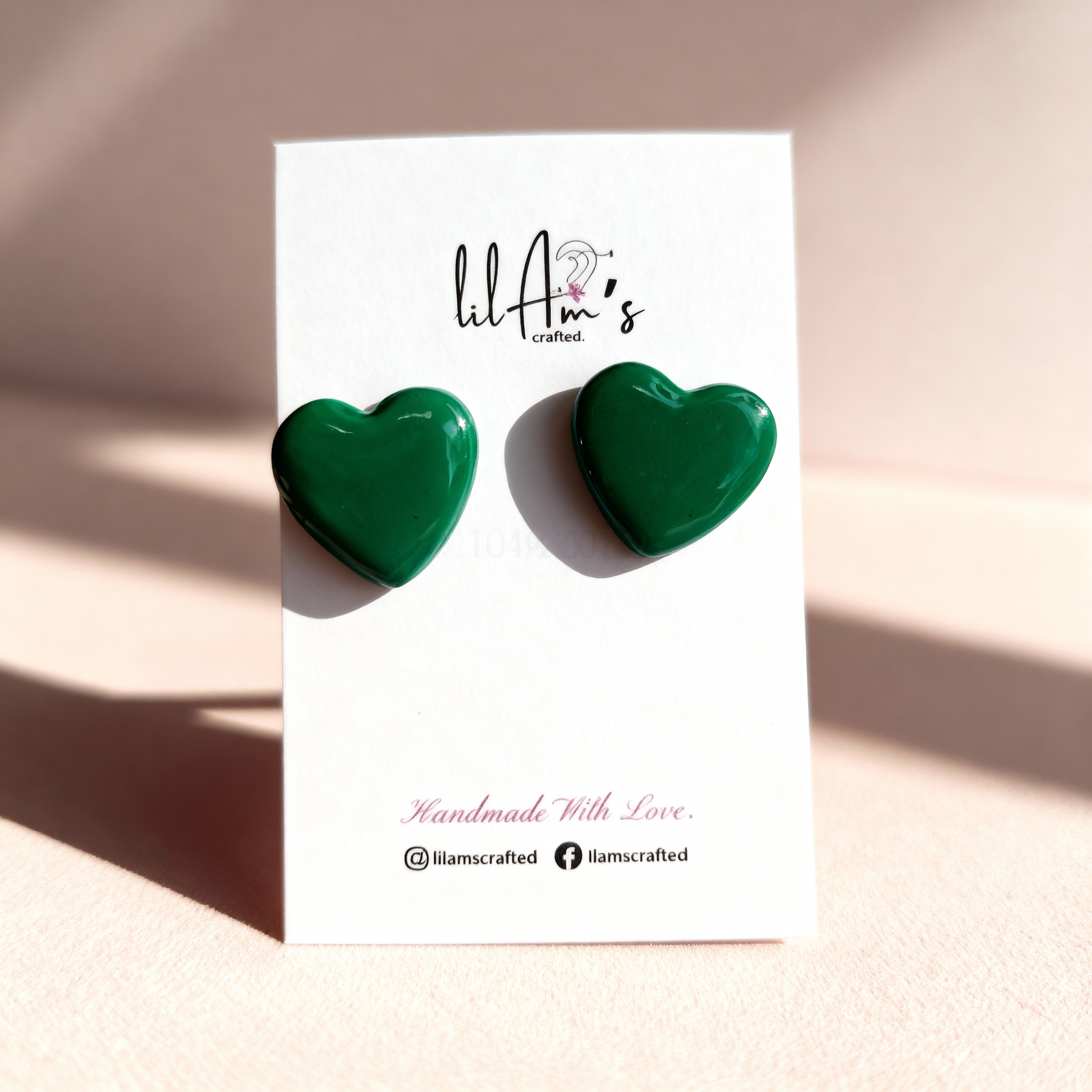 Cute heart clay stud earrings close-up