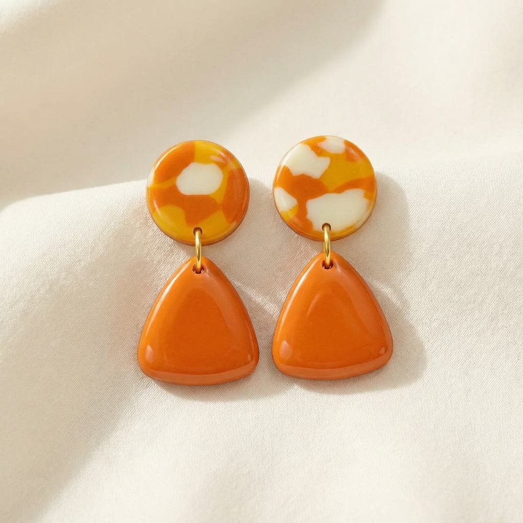 Bold orange resin drop earrings geometric design