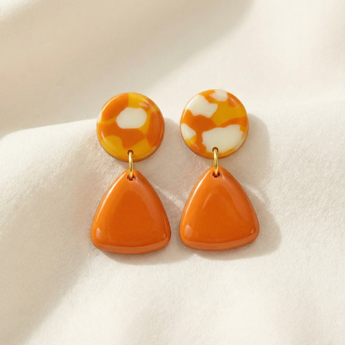 Bold orange resin drop earrings geometric design